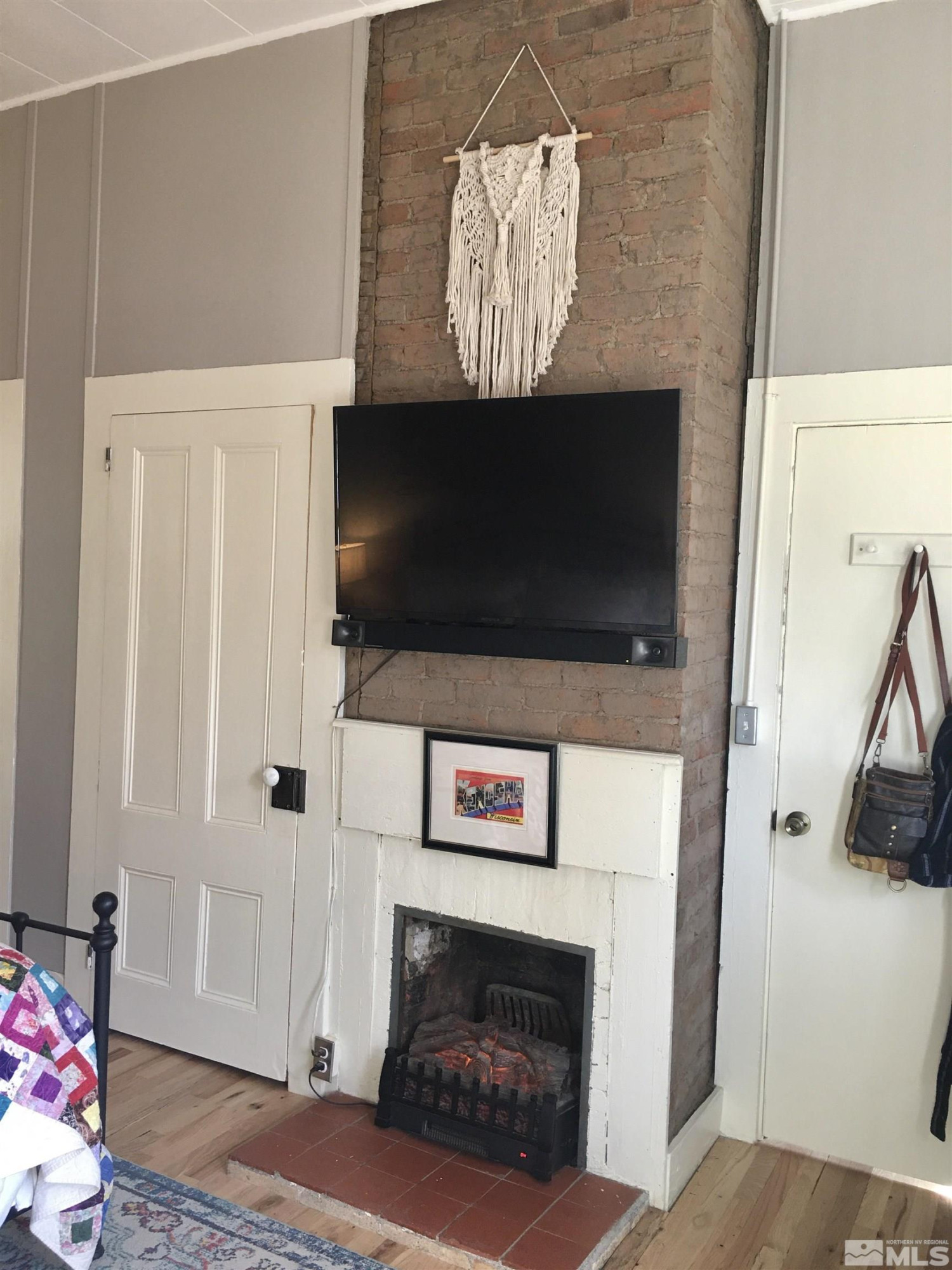 140 Water Street Austin, NV 89310 - Photo 18 of 43 a living room with furniture and a flat screen tv