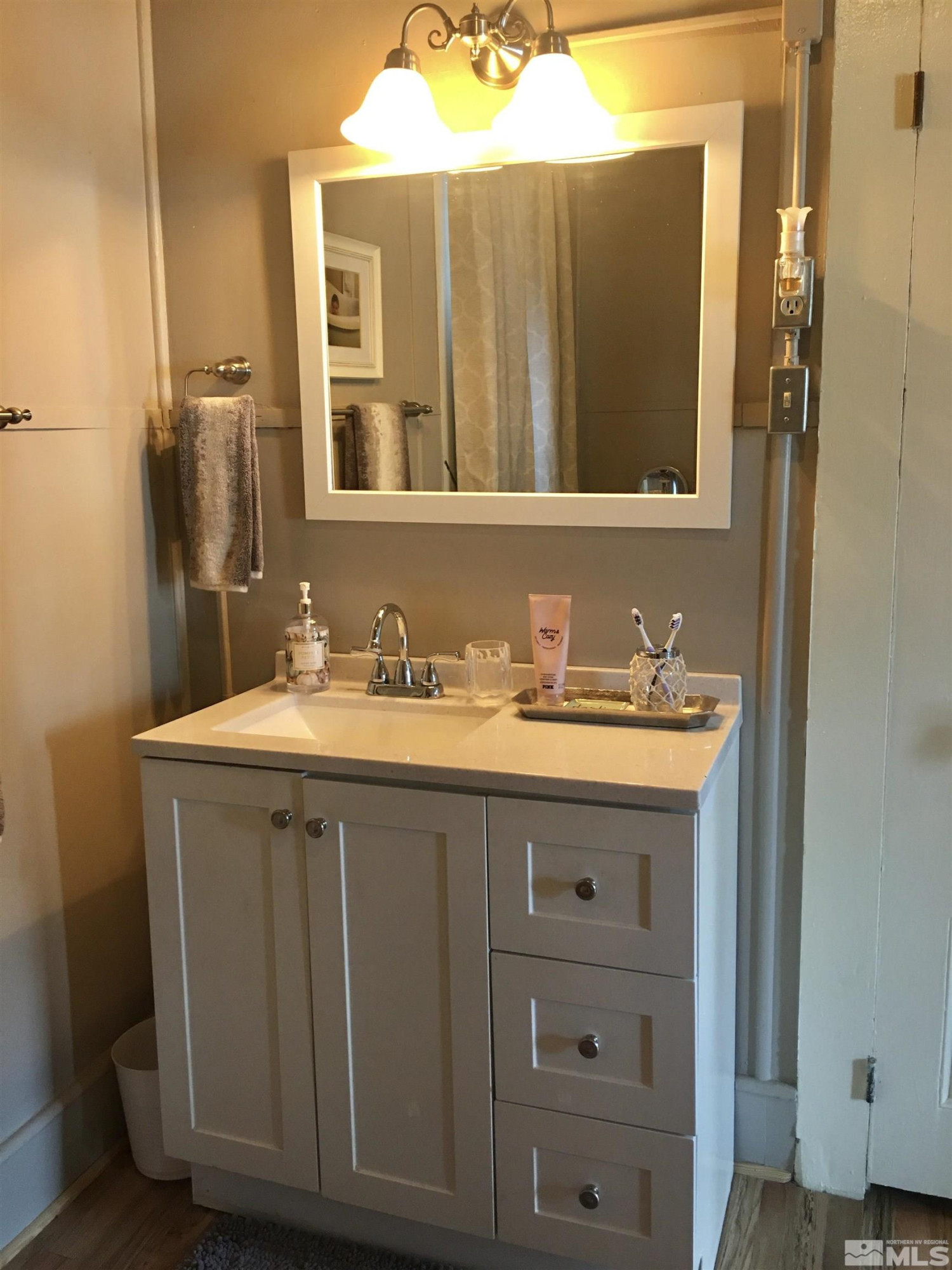 140 Water Street Austin, NV 89310 - Photo 20 of 43 a bathroom with a sink vanity and mirror