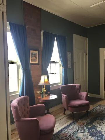 a workspace with furniture and window