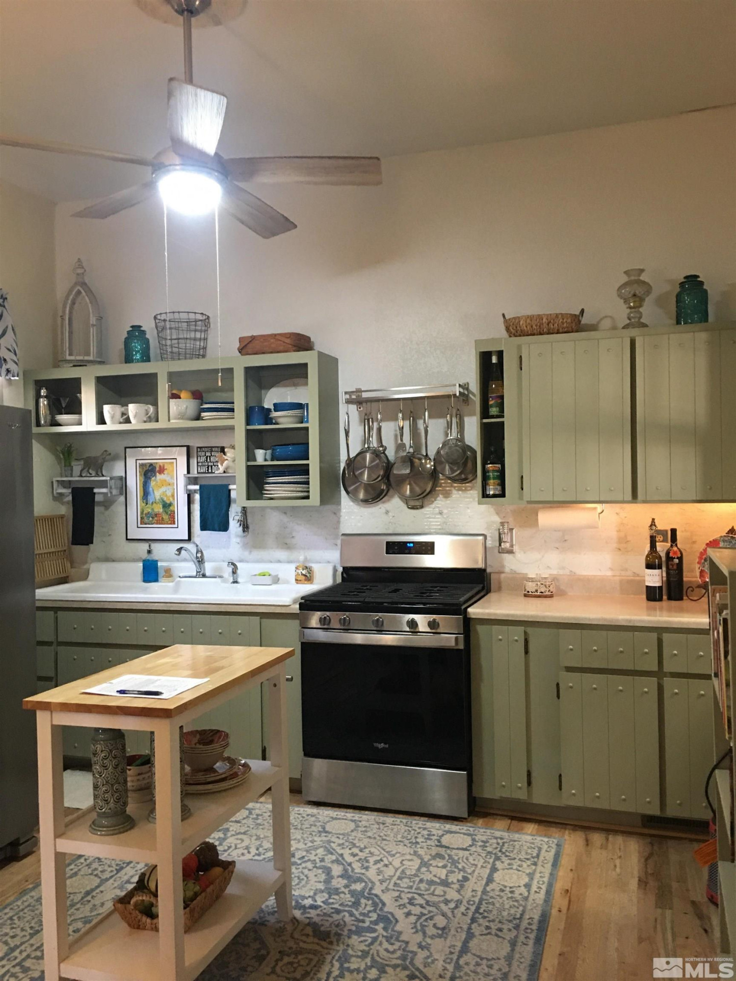 140 Water Street Austin, NV 89310 - Photo 3 of 43 a kitchen with stainless steel appliances granite countertop a stove and a sink