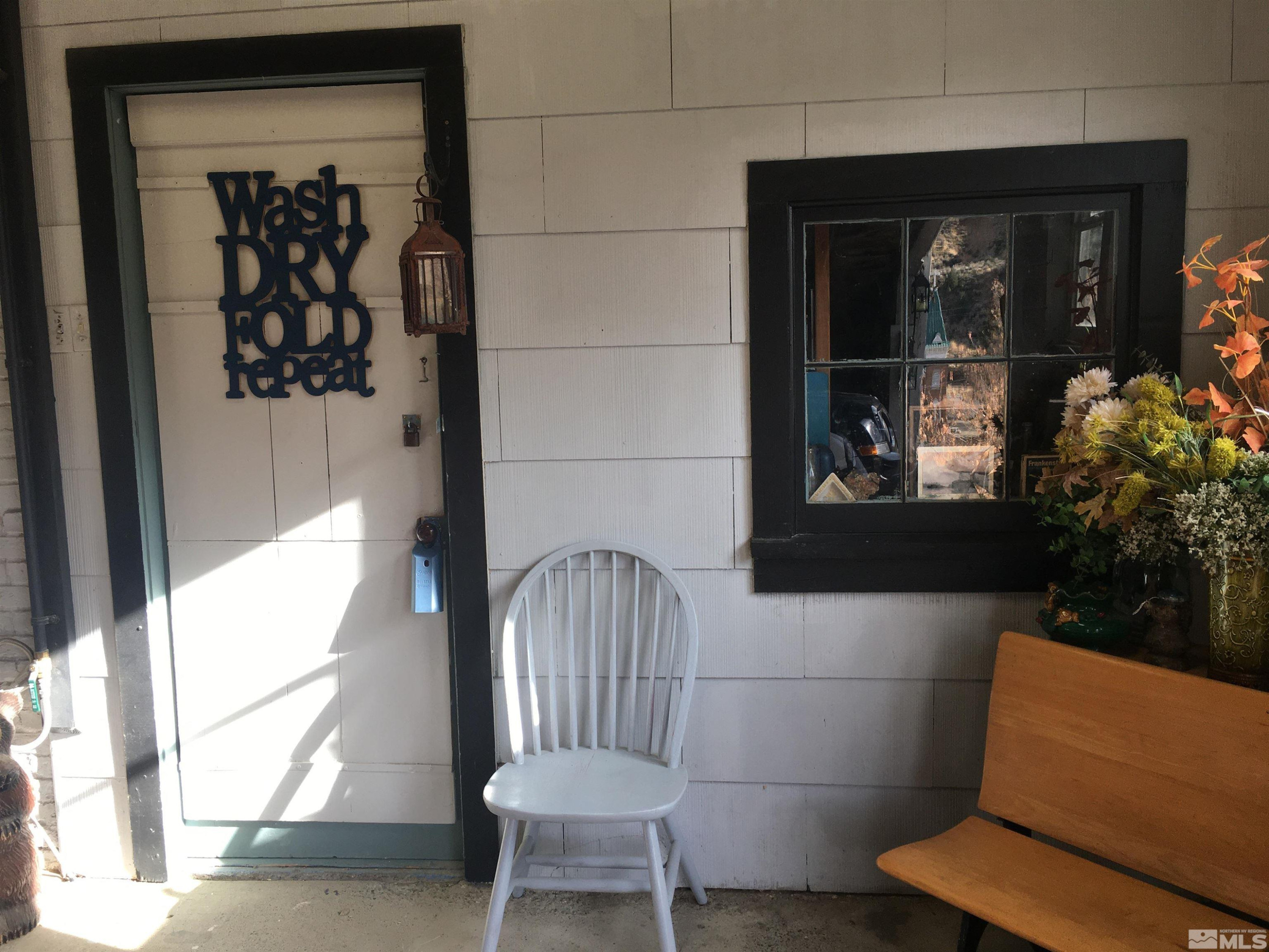 140 Water Street Austin, NV 89310 - Photo 32 of 43 a view of a door and chair and door in the house