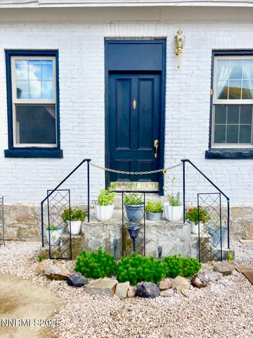 a view of backyard with wooden floor
