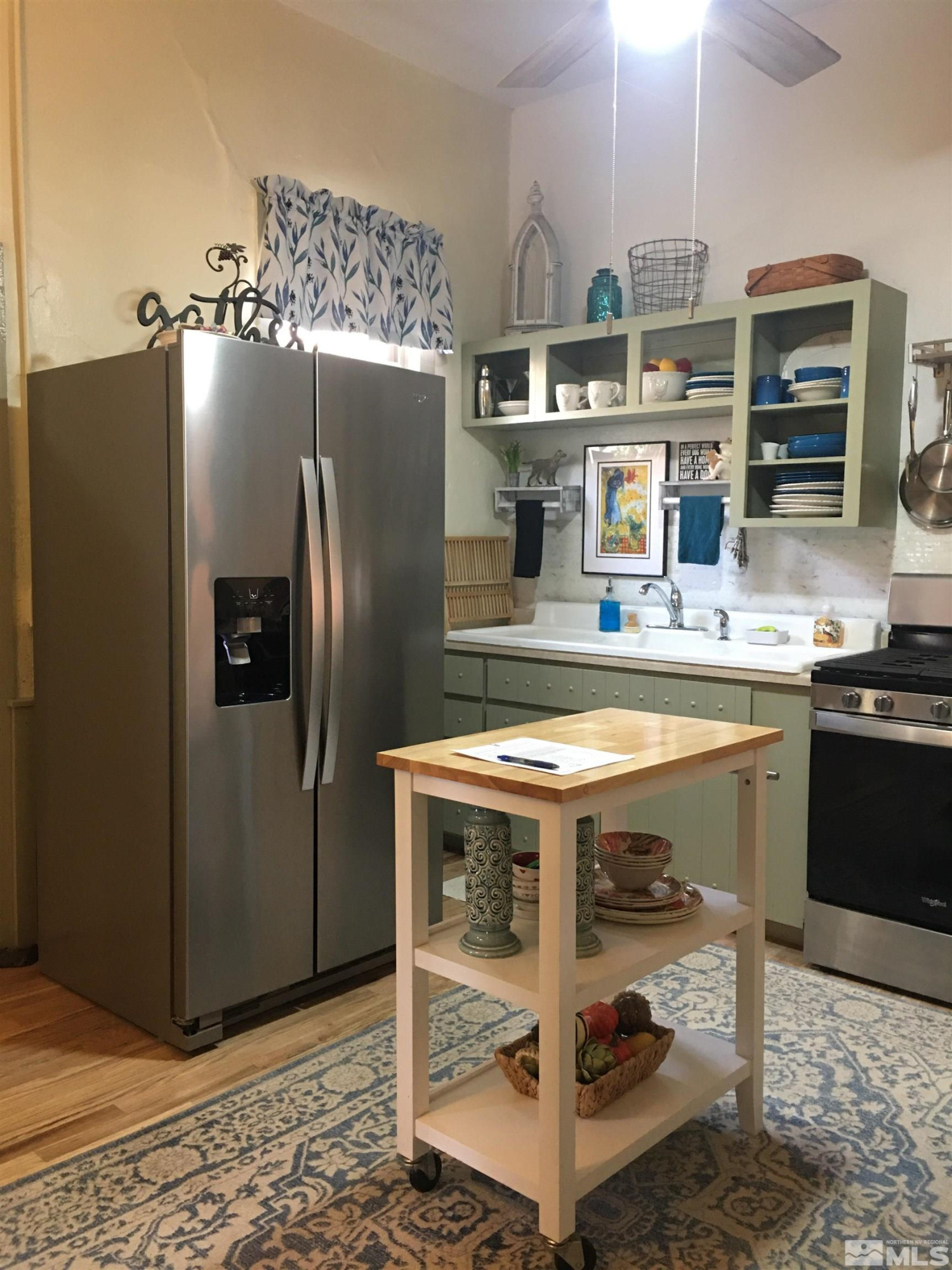 140 Water Street Austin, NV 89310 - Photo 6 of 43 a kitchen with a refrigerator and a stove