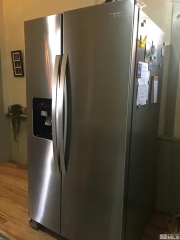 a stove top oven sitting inside of a kitchen