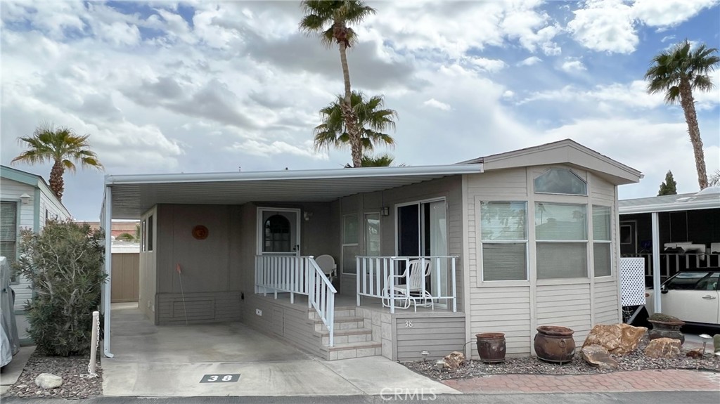 a view of a house with a patio