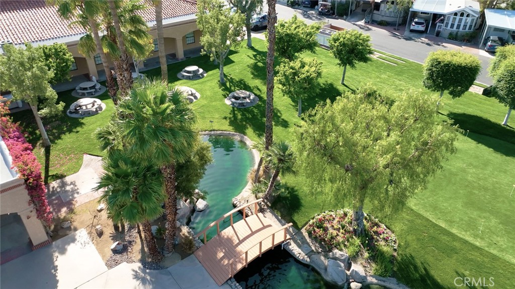 69801 Ramon Road, Unit 38 Cathedral City, CA 92234 - Photo 14 of 47 an aerial view of residential house with outdoor space and trees all around