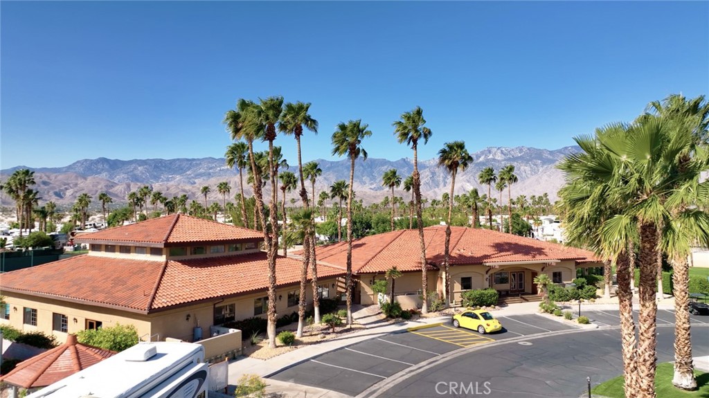 69801 Ramon Road, Unit 38 Cathedral City, CA 92234 - Photo 23 of 47 an outdoor space with pool and furniture