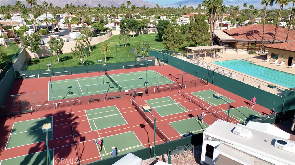 69801 Ramon Road, Unit 38 Cathedral City, CA 92234 - Photo 25 of 47 an aerial view of a houses with a swimming pool