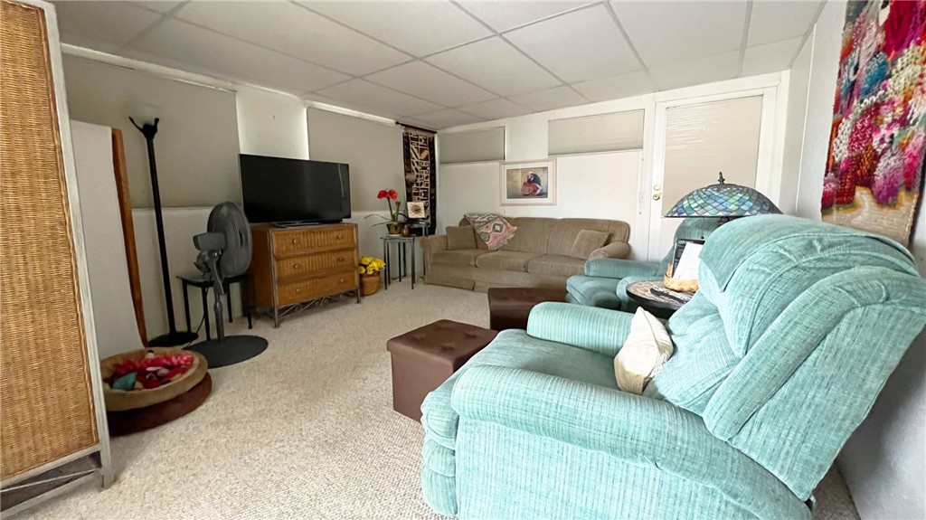69801 Ramon Road, Unit 38 Cathedral City, CA 92234 - Photo 3 of 47 a living room with furniture and a flat screen tv