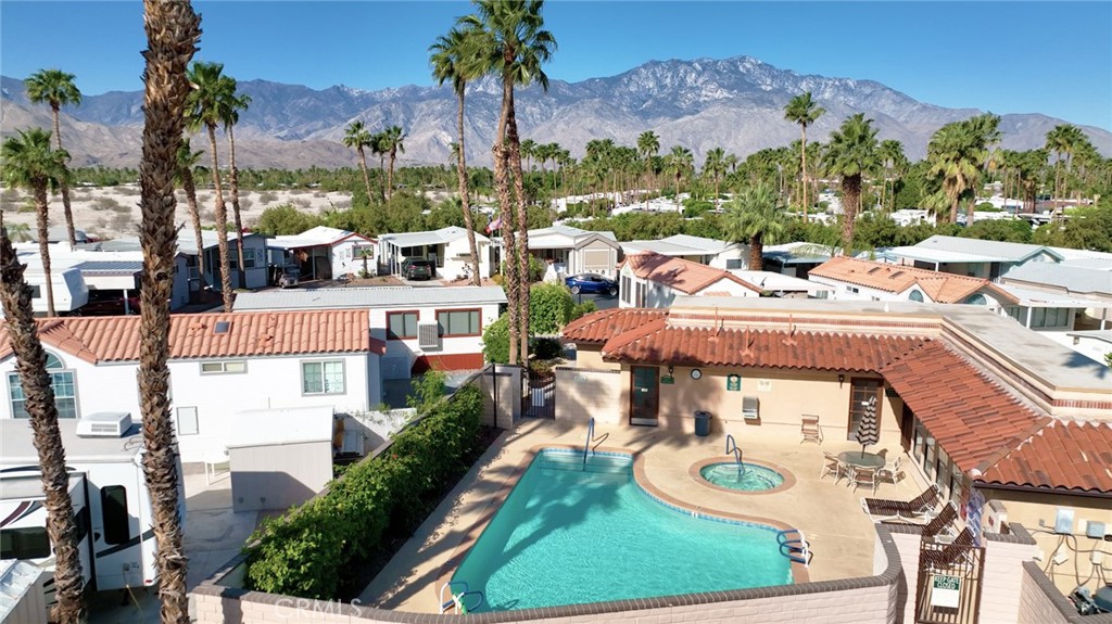 69801 Ramon Road, Unit 38 Cathedral City, CA 92234 - Photo 39 of 47 a view of a patio with swimming pool