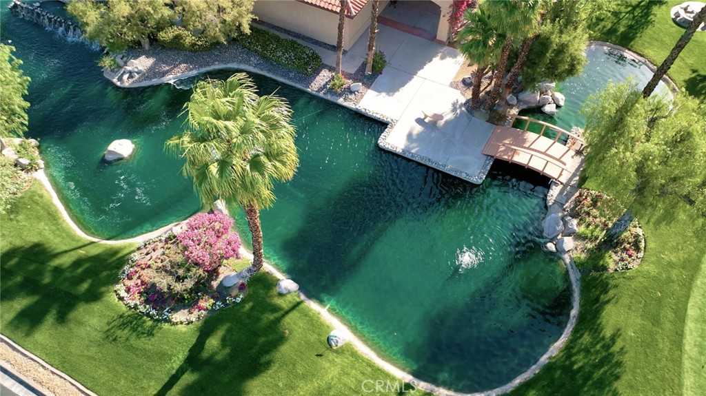 69801 Ramon Road, Unit 38 Cathedral City, CA 92234 - Photo 44 of 47 an aerial view of a golf course with a garden