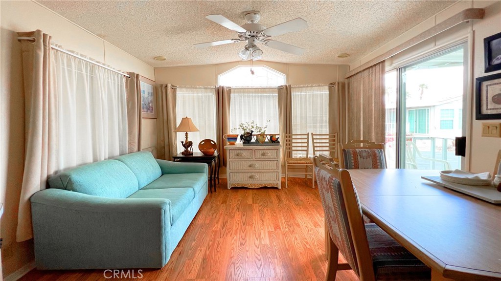 69801 Ramon Road, Unit 38 Cathedral City, CA 92234 - Photo 6 of 47 a living room with furniture and a large window