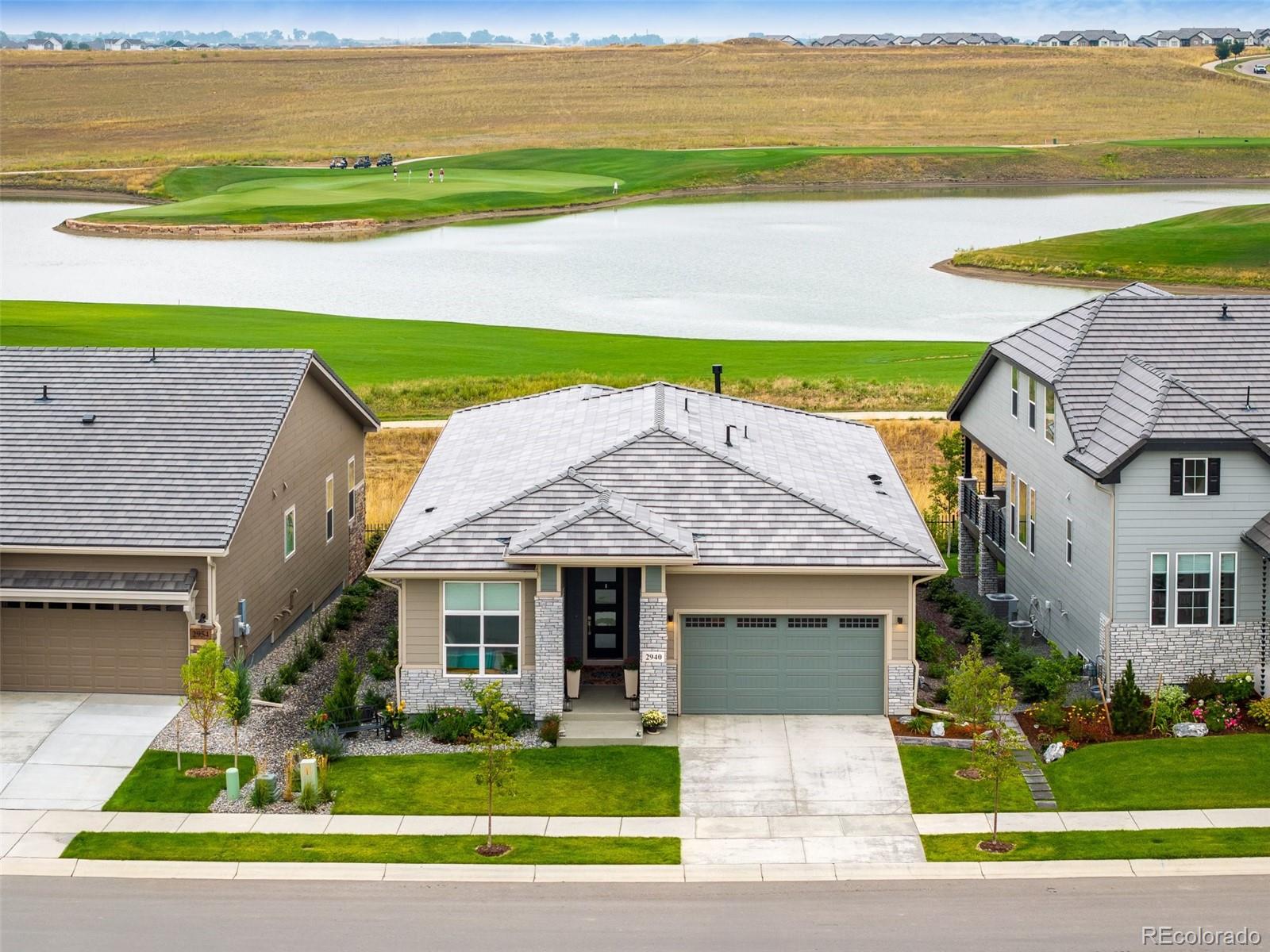2940 Newfound Lk Road Berthoud, CO 80513 - Photo 5 of 42 a front view of a house with a yard and ocean view