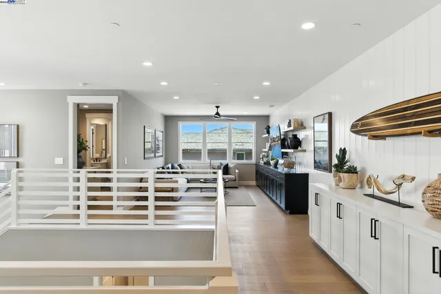 a bath room with sink and a mirror