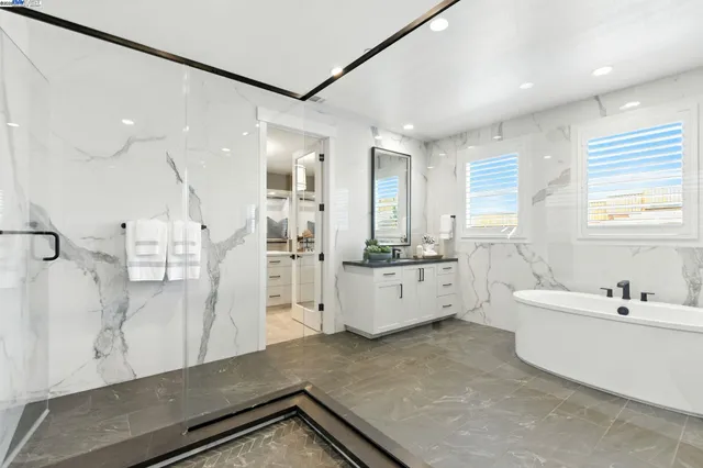 a kitchen with counter top space cabinets and appliances