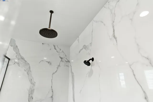 a bedroom with bed and window