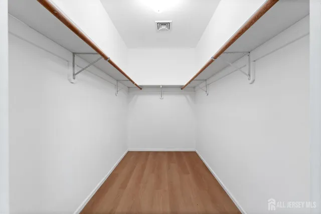 a view of a room with racks on the wall