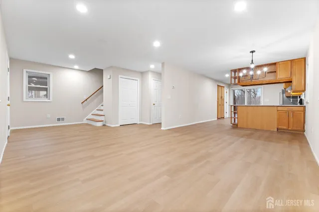 a view of a kitchen with a dishwasher and cabinets