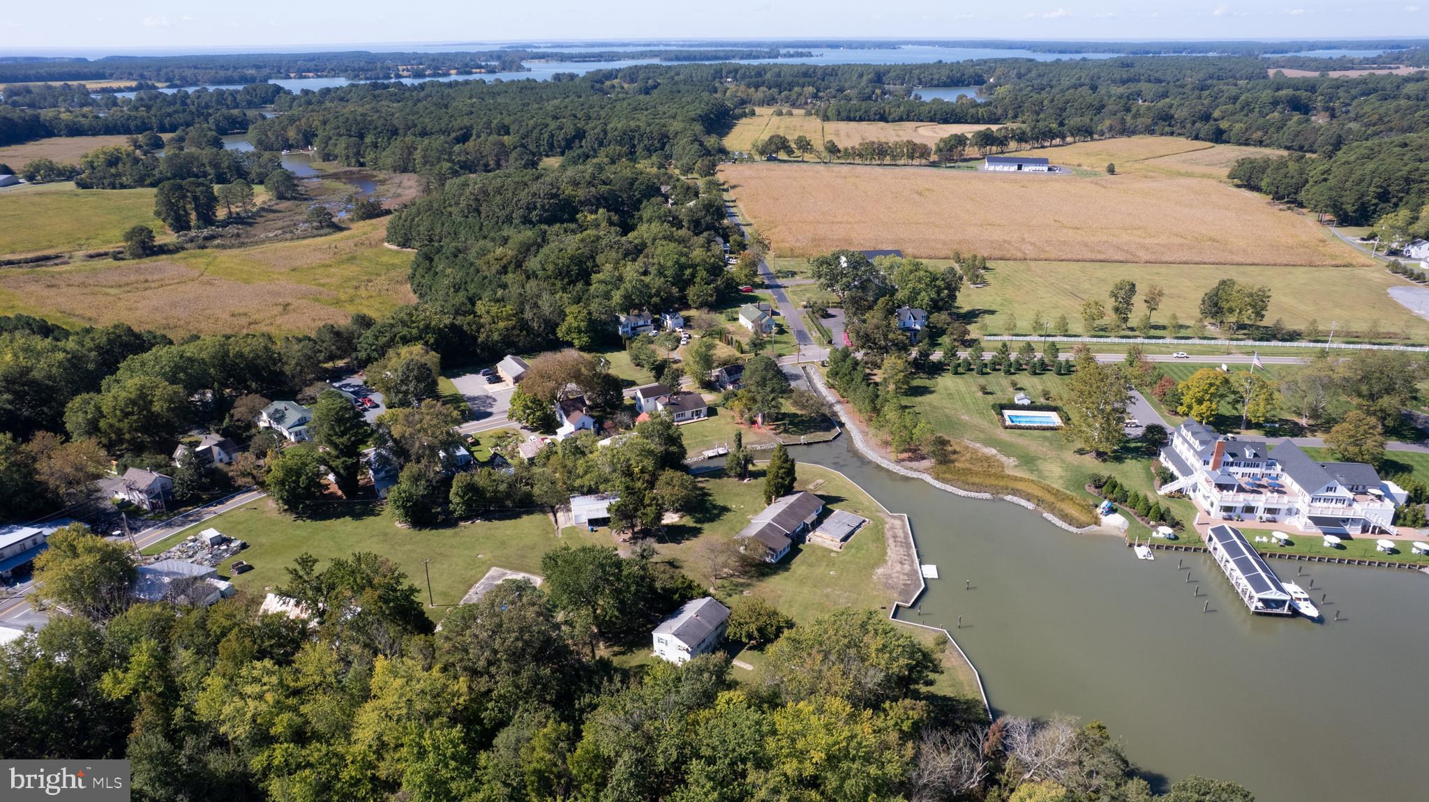 7049 Acorn Alley Newcomb, MD 21653 - Photo 11 of 40 an aerial view of a house with a lake view