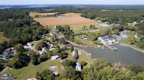 an aerial view of lake and residential houses