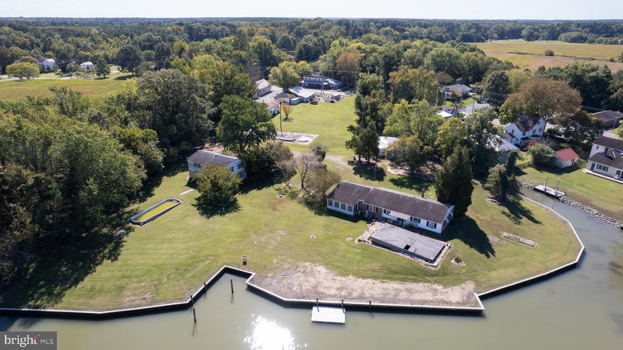 7049 Acorn Alley Newcomb, MD 21653 - Photo 17 of 40 an aerial view of a house with a yard lake view and mountain view