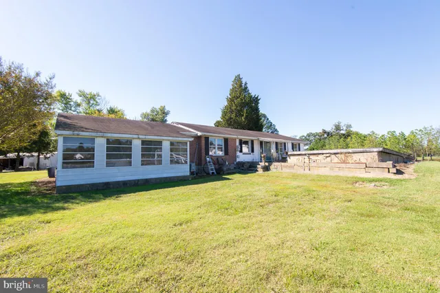 a view of a house with a swimming pool
