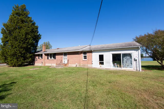 a front view of a house with yard