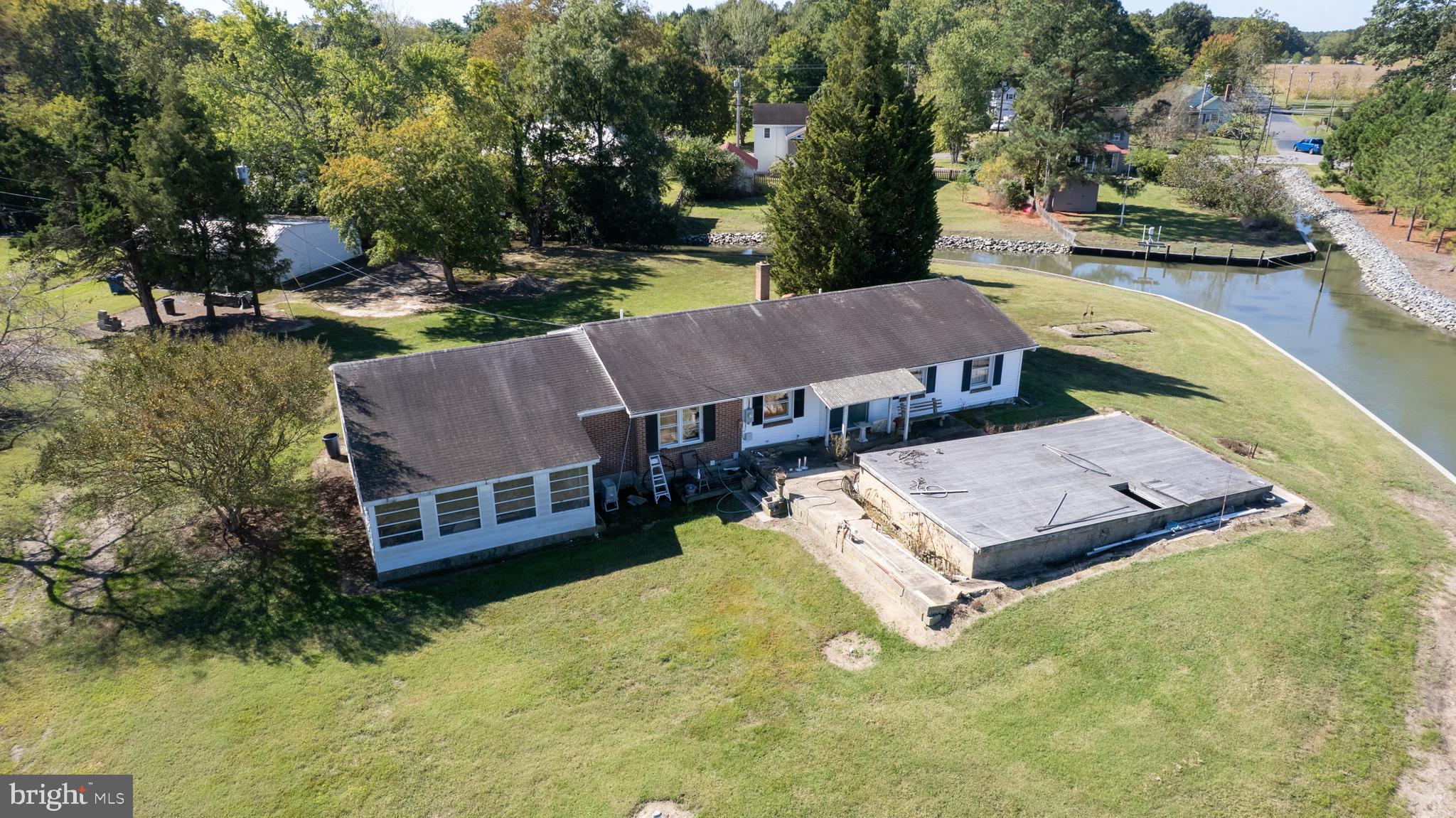 7049 Acorn Alley Newcomb, MD 21653 - Photo 31 of 40 an aerial view of a house with swimming pool garden and patio