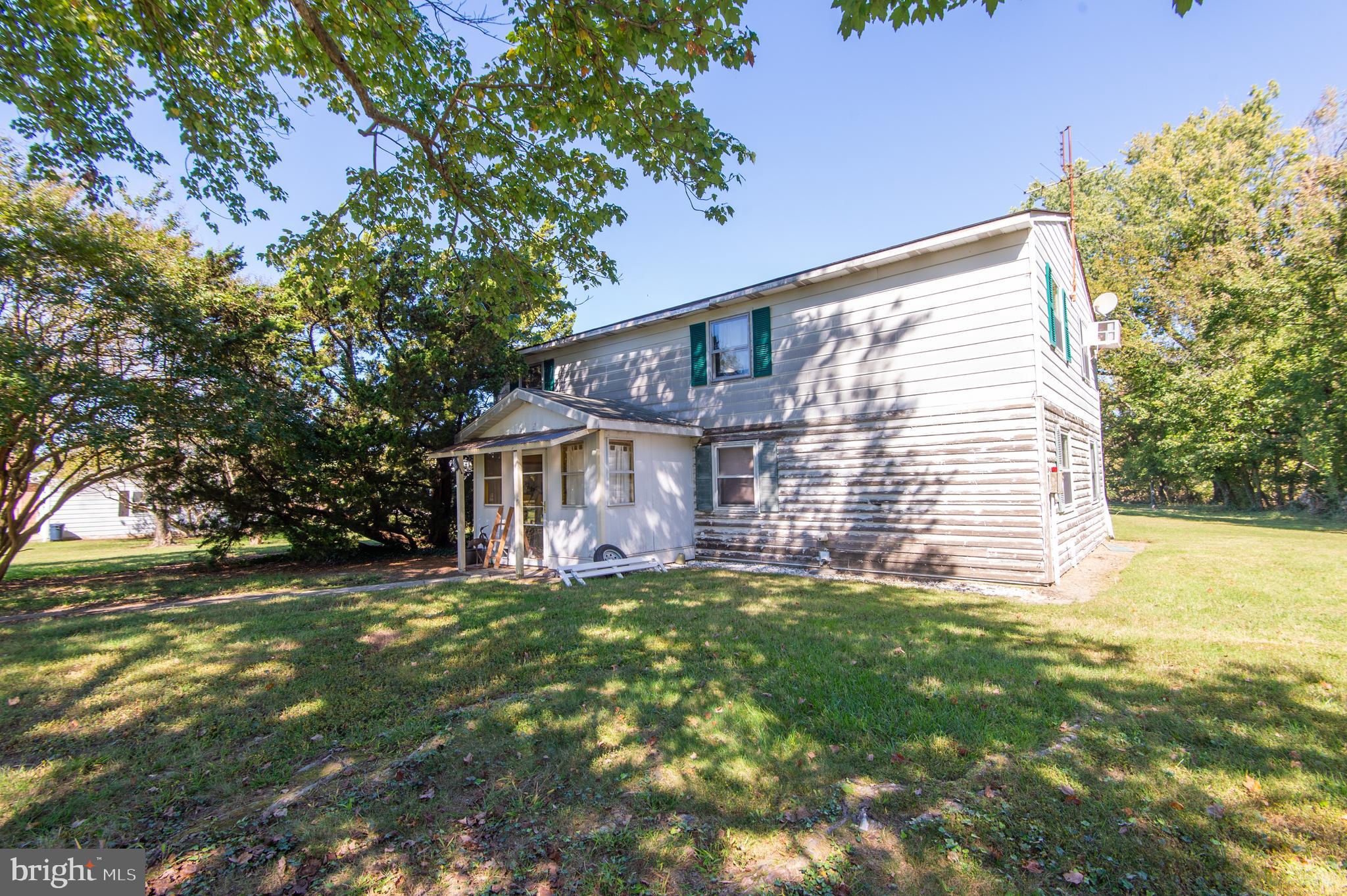7049 Acorn Alley Newcomb, MD 21653 - Photo 35 of 40 a view of a house with a yard