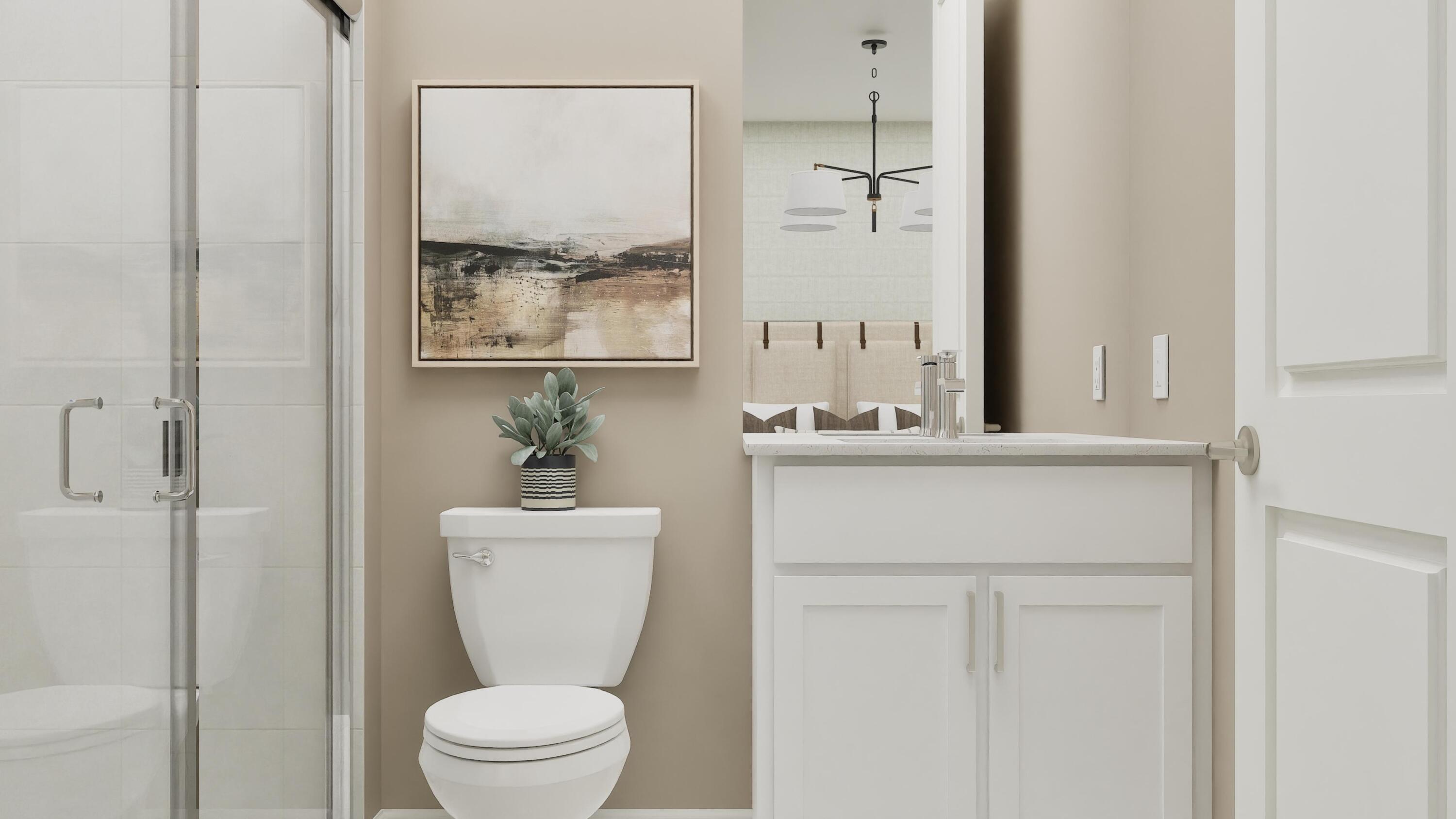 1014 Raleigh Way Wellington, FL 33449 - Photo 2 of 25 a bathroom with a toilet sink and mirror