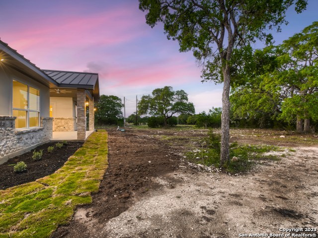 208 River Ridge Boerne, TX 78006 - Photo 27 of 38 a view of a house with a yard