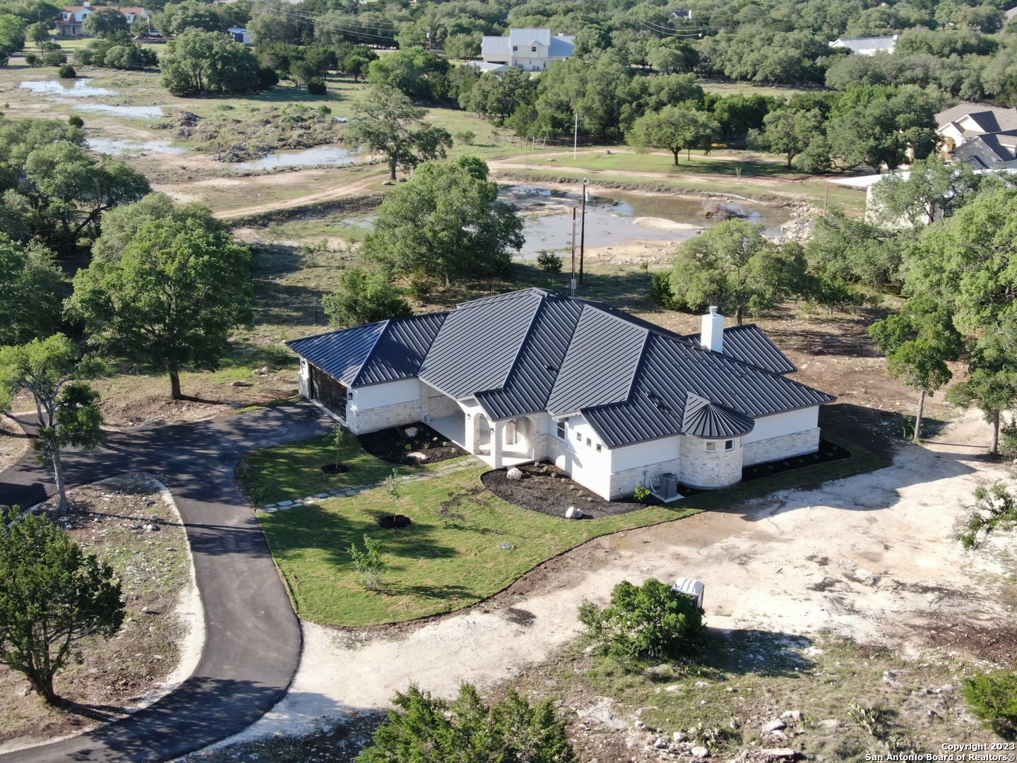 208 River Ridge Boerne, TX 78006 - Photo 29 of 38 a view of a house with a yard