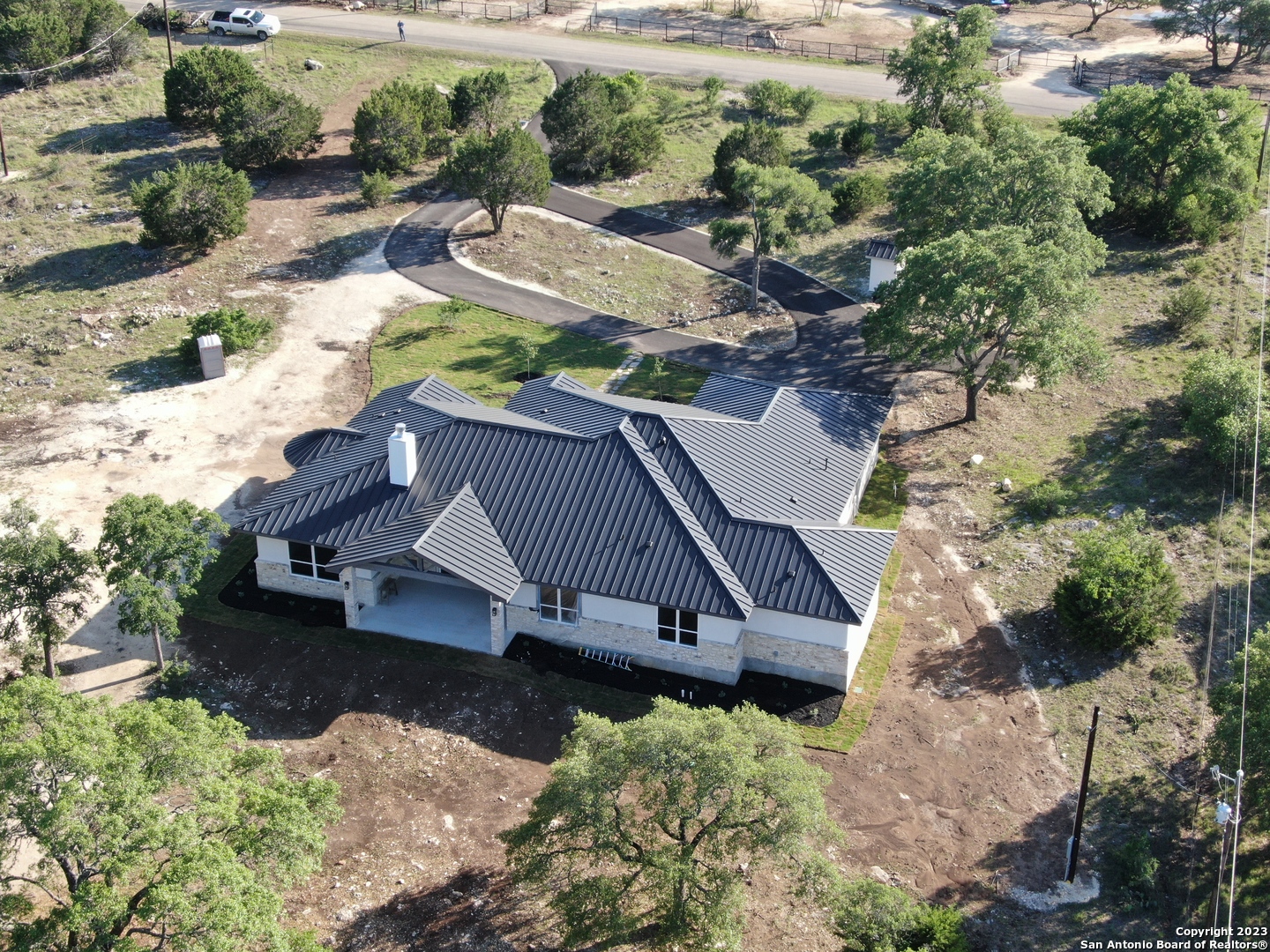 208 River Ridge Boerne, TX 78006 - Photo 30 of 38 an aerial view of garden with patio