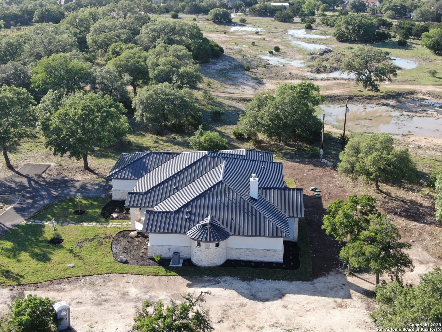 208 River Ridge Boerne, TX 78006 - Photo 32 of 38 a view of a house with a yard