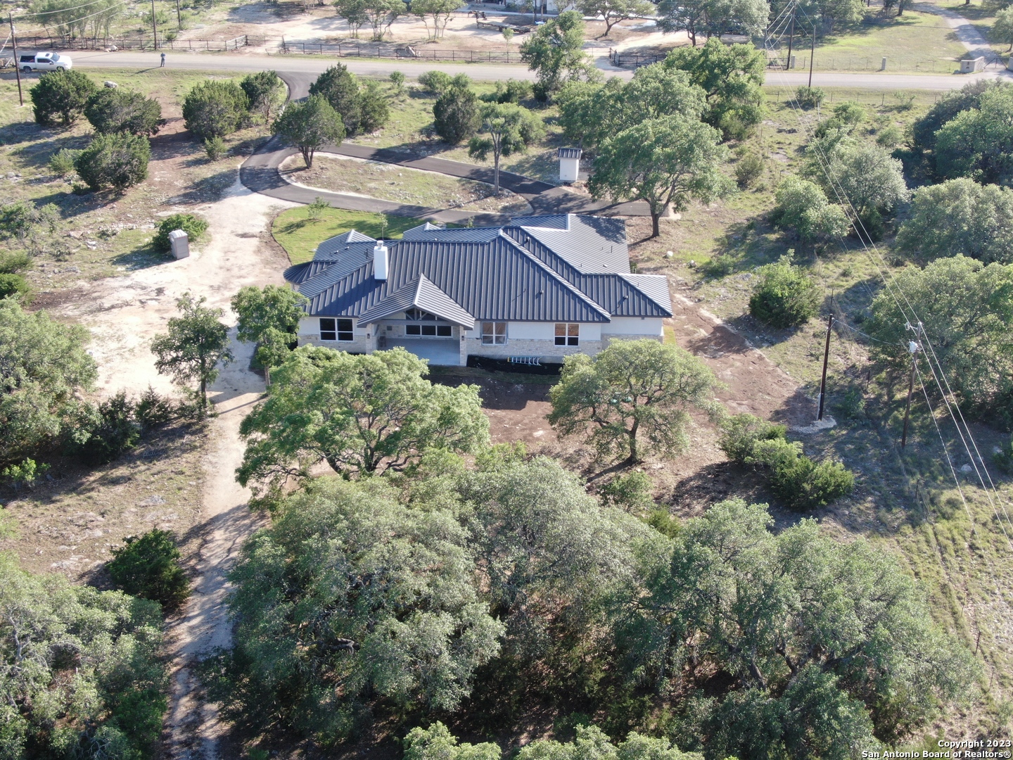 208 River Ridge Boerne, TX 78006 - Photo 34 of 38 an aerial view of house with yard and lake view