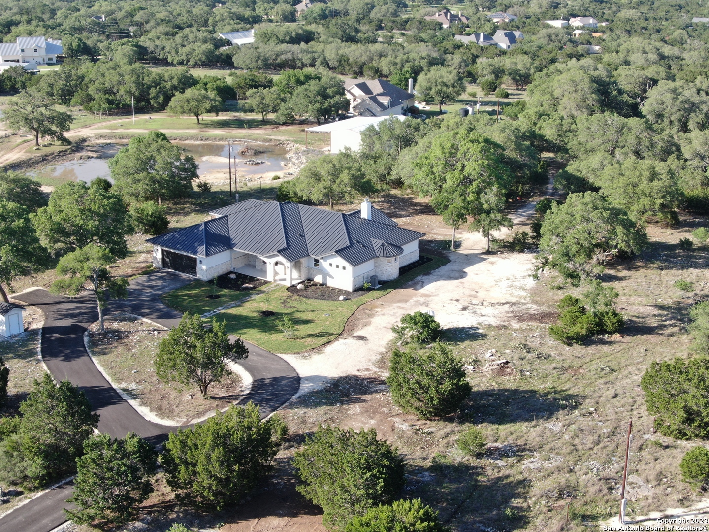 208 River Ridge Boerne, TX 78006 - Photo 37 of 38 an aerial view of a house with yard swimming pool and outdoor seating