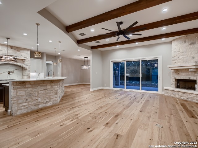 208 River Ridge Boerne, TX 78006 - Photo 5 of 38 a view of an empty room with a kitchen