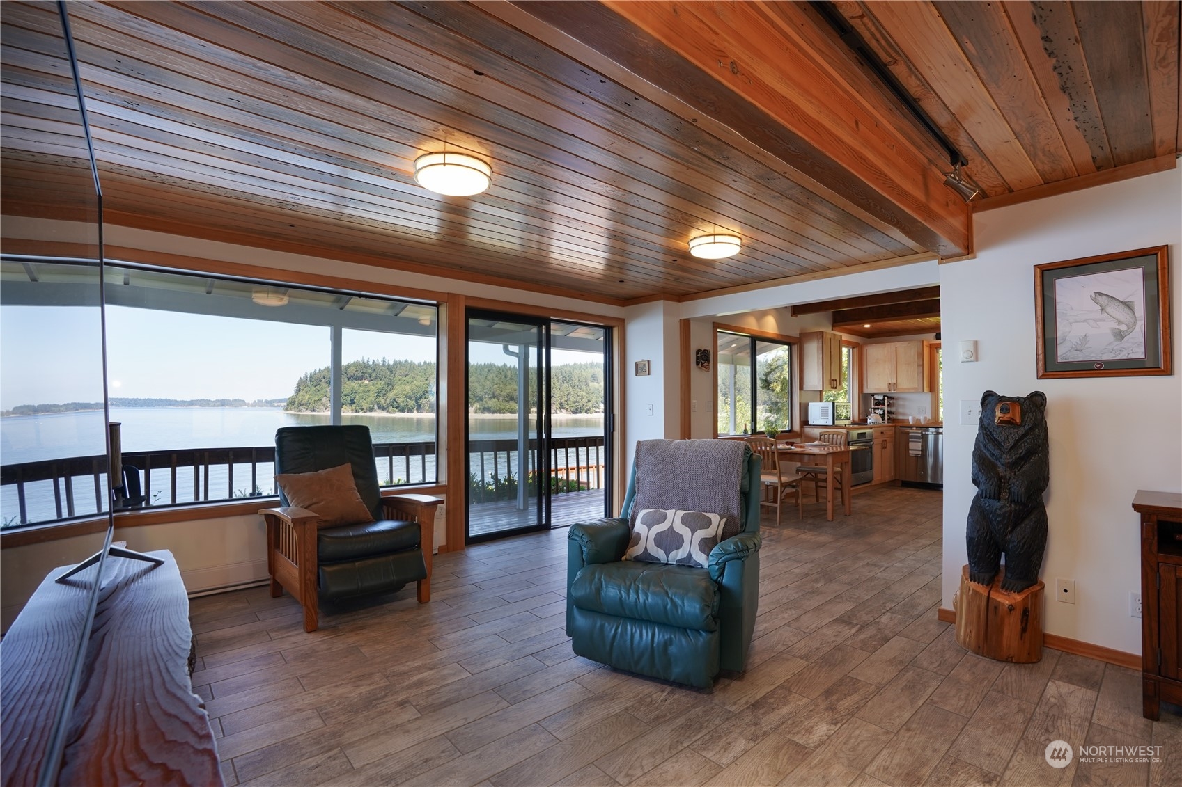 14507 Outer Bay Road Anderson Island, WA 98303 - Photo 17 of 40 a living room with furniture and a large window