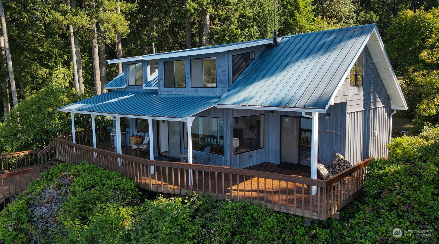 14507 Outer Bay Road Anderson Island, WA 98303 - Photo 2 of 40 front view of a house with a small yard
