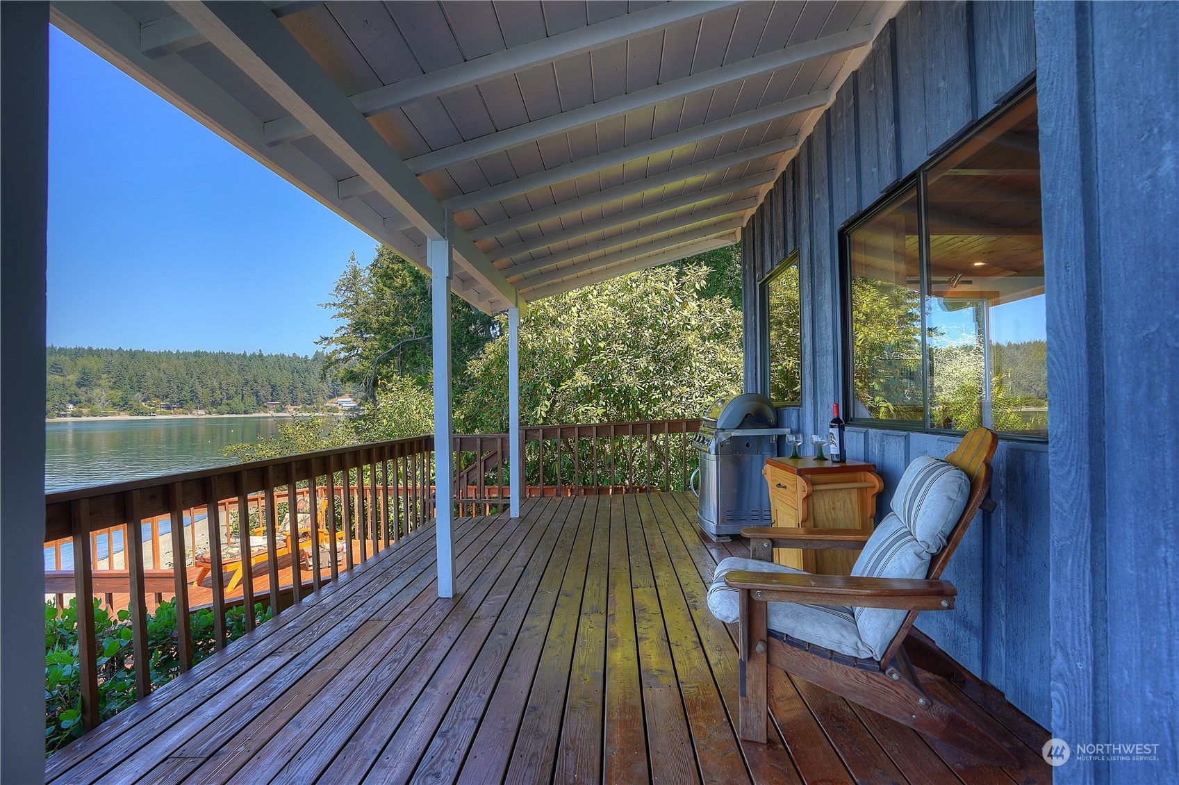 14507 Outer Bay Road Anderson Island, WA 98303 - Photo 6 of 40 a view of two chairs in a balcony