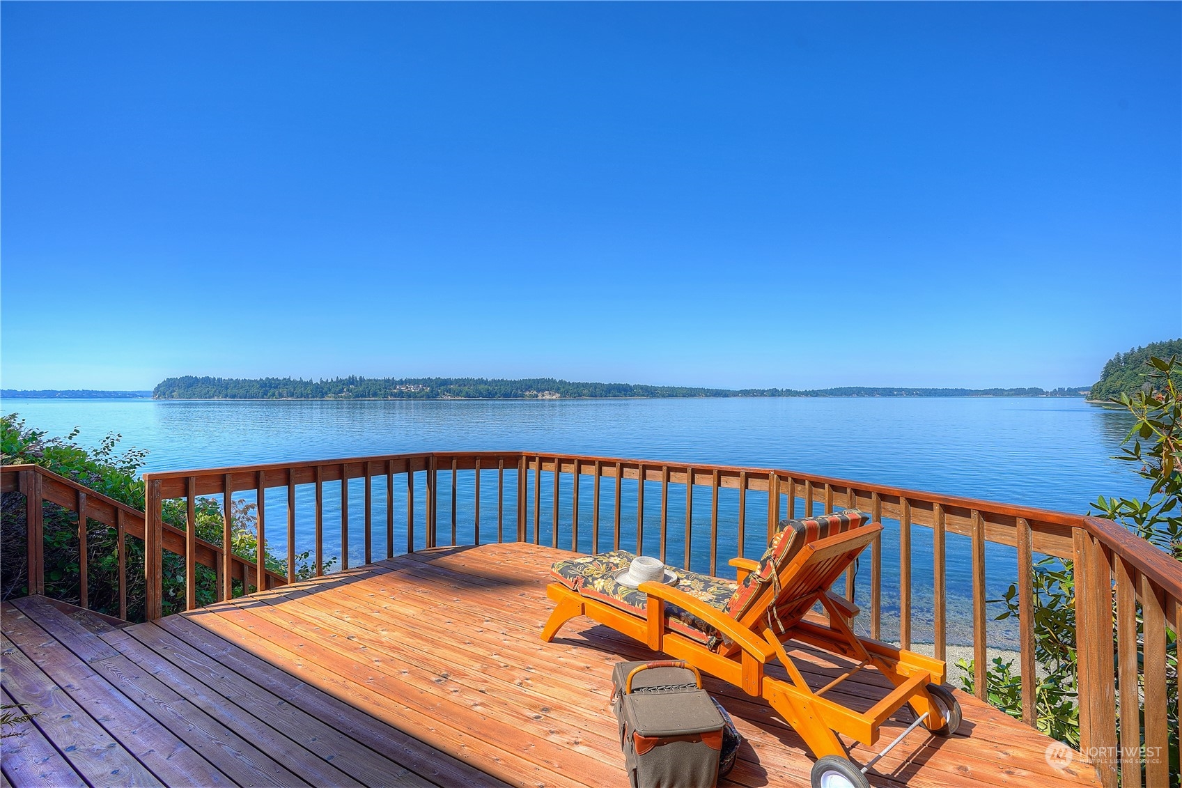 14507 Outer Bay Road Anderson Island, WA 98303 - Photo 8 of 40 a view of a roof deck with wooden floor and fence