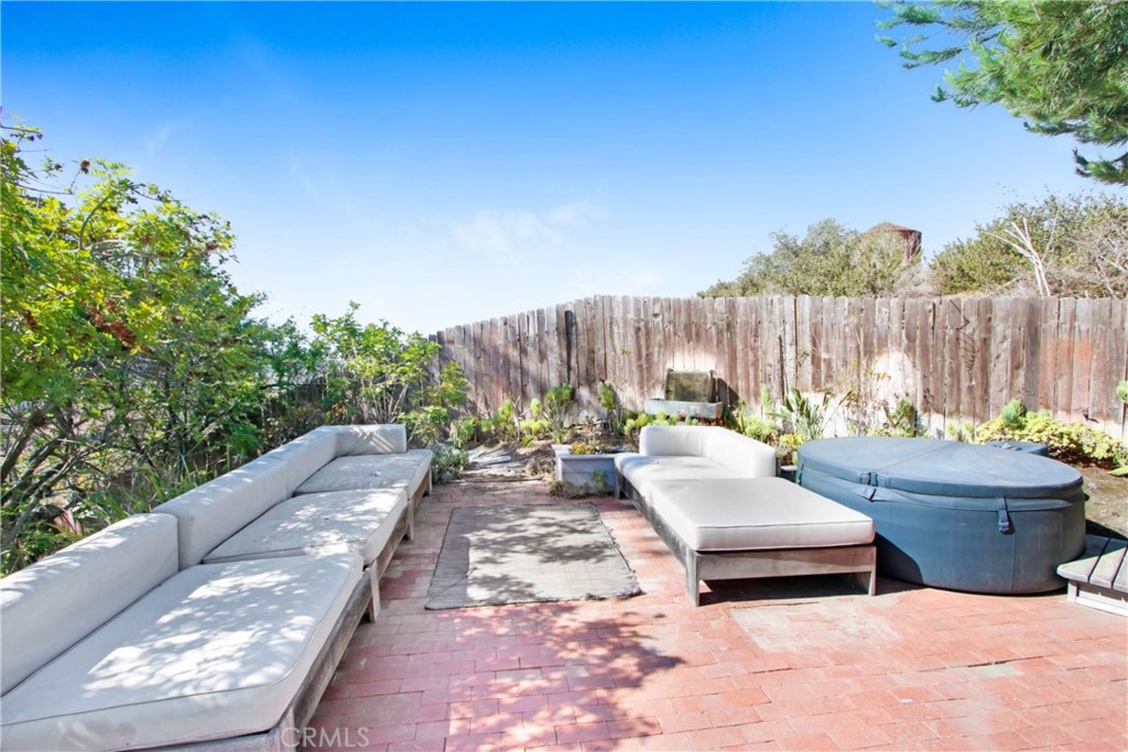 1486 Morningside Circle, Unit MAIN Laguna Beach, CA 92651 - Photo 10 of 24 a view of a backyard with a patio