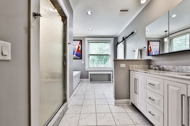 a room with a fireplace and a window