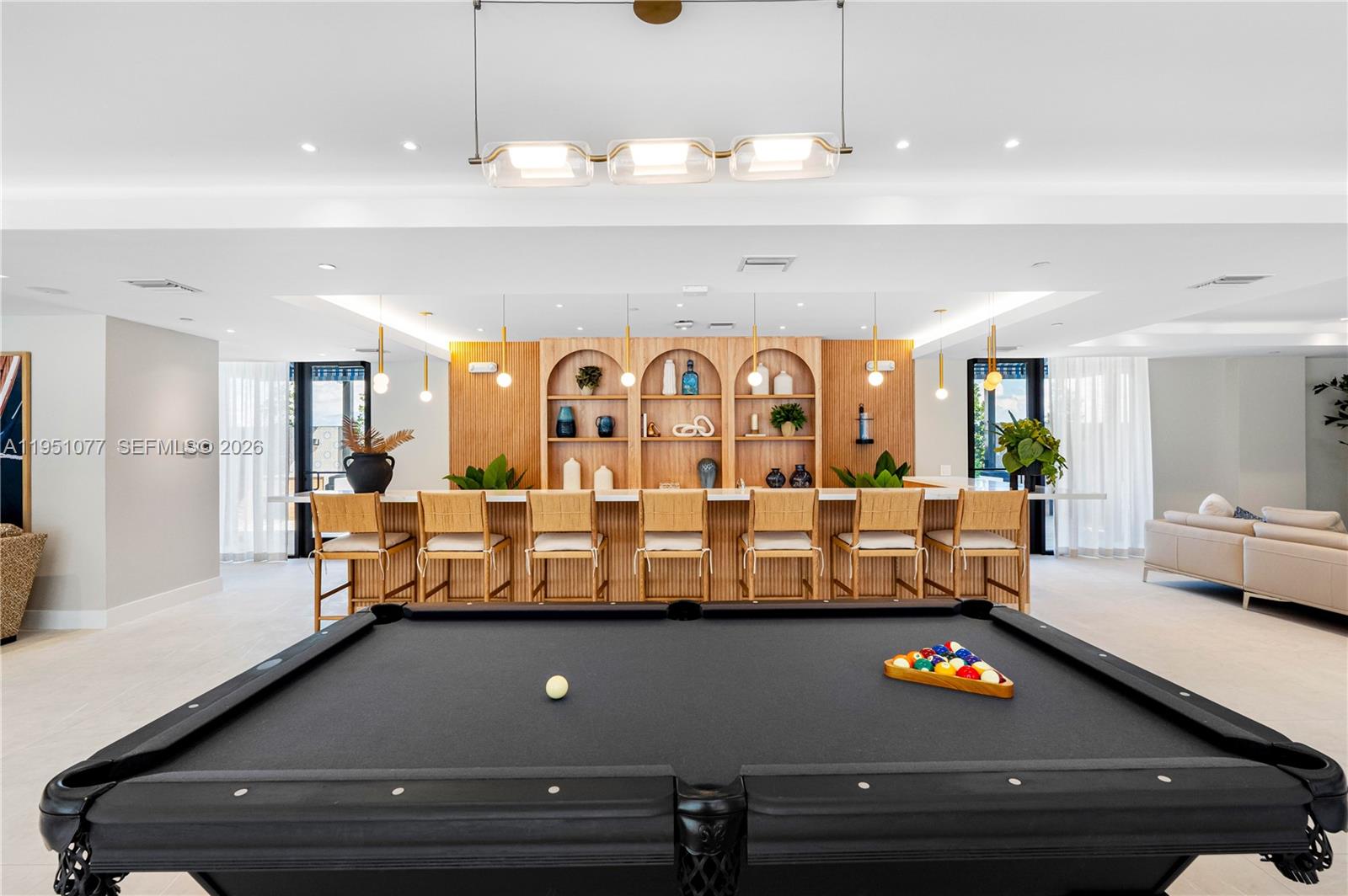 208 North Federal Highway, Unit 361 Pompano Beach, FL 33062 - Photo 11 of 25 a living room with furniture and a flat screen tv