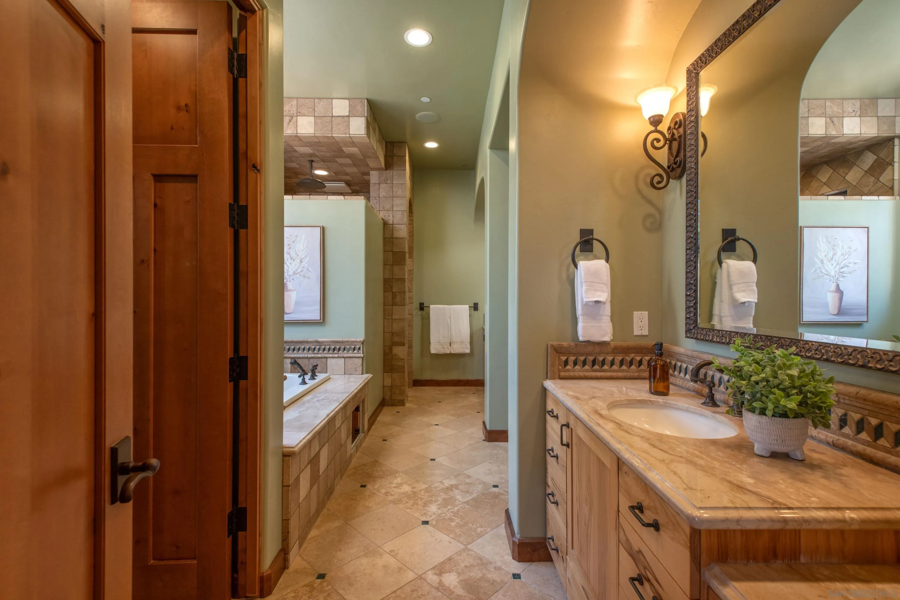 23835 Viejas Grade Road Descanso, CA 91916 - Photo 31 of 62 a bathroom with a granite countertop sink a mirror and a shower