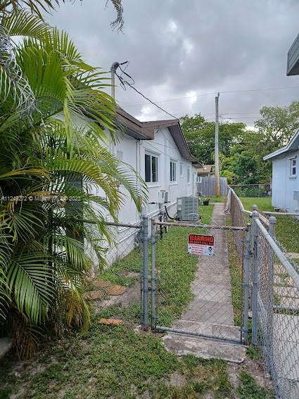 Sunset Miami, FL 33173 - Photo 4 of 18 a view of a house with a yard