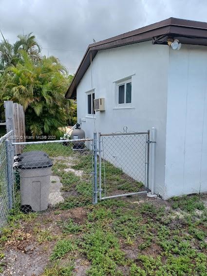Sunset Miami, FL 33173 - Photo 5 of 18 a view of backyard of house and wooden fence