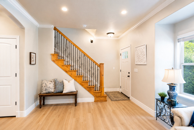 896 Cres Drive South Mapleton, UT 84664 - Photo 5 of 32 Staircase featuring wood treads and a wrought-iron baluster system