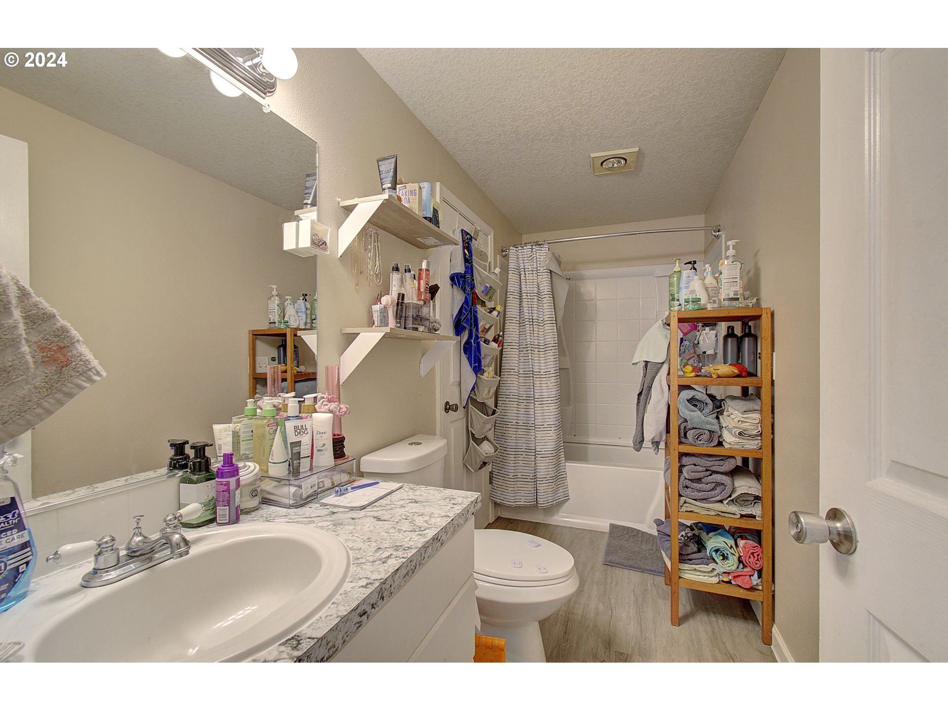 2010 Northeast Stapleton Road Vancouver, WA 98661 - Photo 19 of 26 a bathroom with a sink a toilet and shower