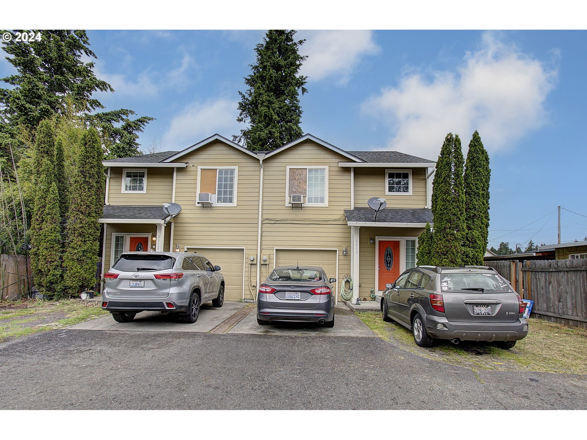 2010 Northeast Stapleton Road Vancouver, WA 98661 - Photo 2 of 26 a car parked in front of a house